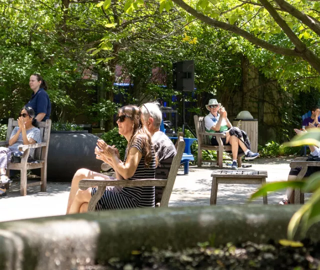 People sitting in our reading garden