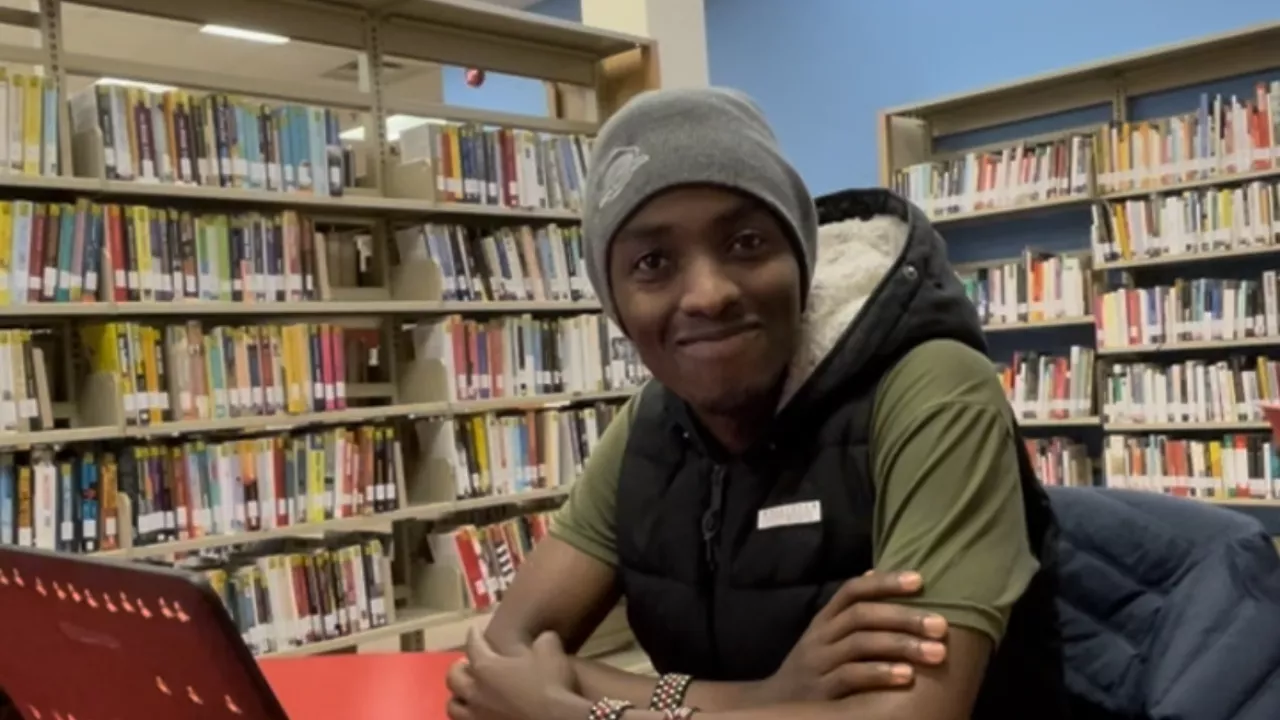 Student with laptop computer at Sherwood Branch Library