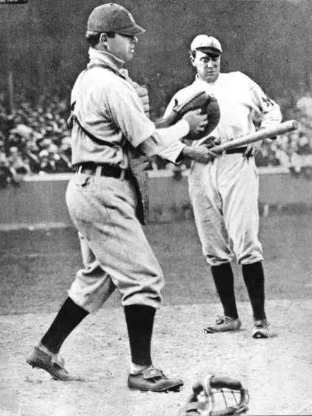 Black and white photograph of two baseball players