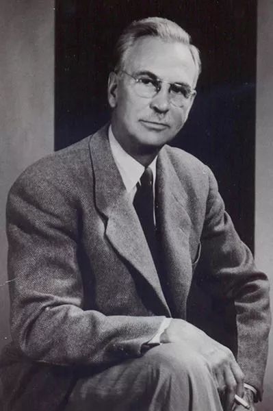 Black and white photos of a man in a suit