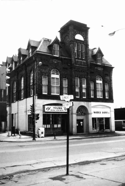 Black and white photo of the East London Town Hall, looking southwest