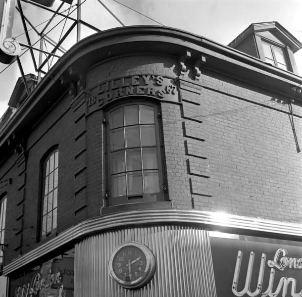 Black and white photograph, looking upwards and south east to the second floor of the building