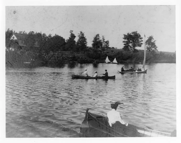 Black and white photograph of 5 boats on the Thames river